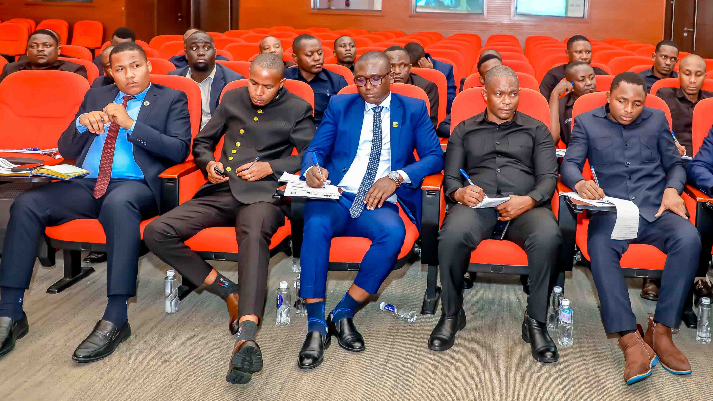 Madereva wa Ofisi ya Wakili Mkuu wa Serikali wakimsikiliza Naibu Wakili Mkuu wa Serikali wakati akifungua mafunzo elekezi kwa madereva hao yaliyofanyika Kibaha mkoani Pwani.
